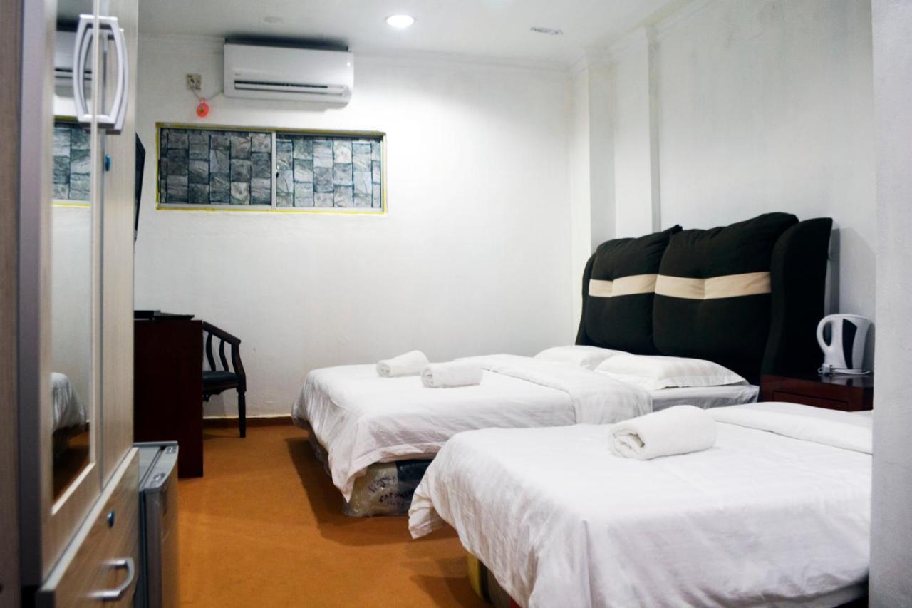 Warisan Family Inn Semporna Buitenkant foto
