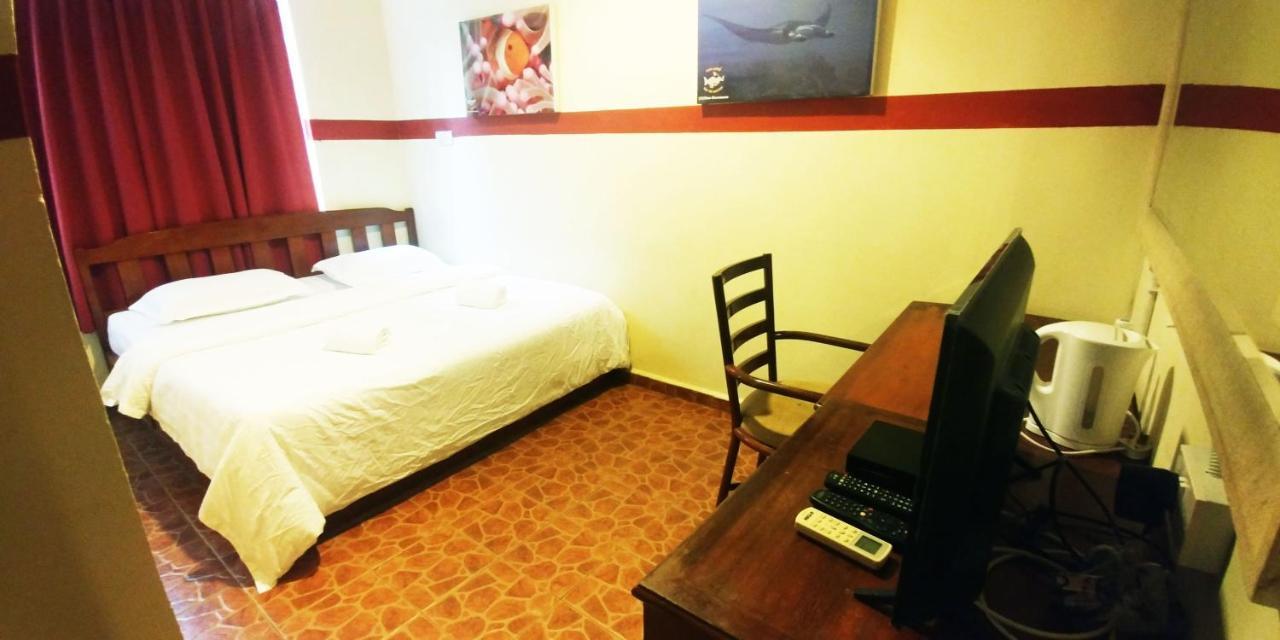 Warisan Family Inn Semporna Buitenkant foto